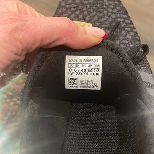 Brand new, never worn, with tags Adidas Women’s sneakers. Black and gray.